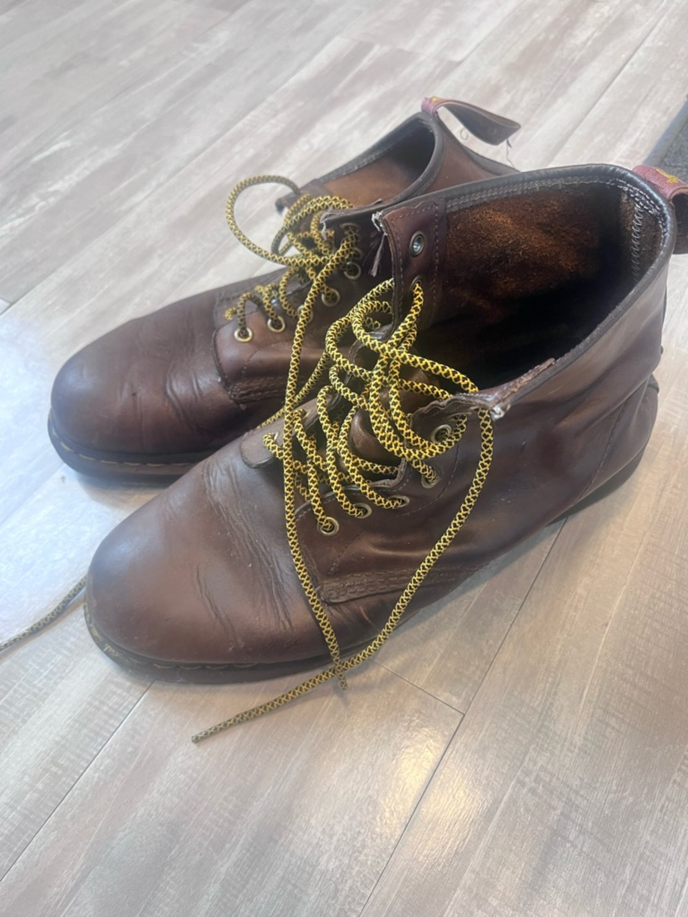 Dr. Martens Brown Leather Work Boots with Yellow Accent Laces